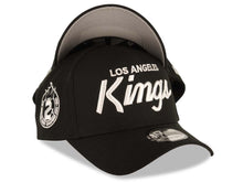 Load image into Gallery viewer, Los Angeles Kings New Era NHL 9FORTY 940 Adjustable A-Frame Cap Hat Black Crown/Visor White Script Logo 2x Champions Side Patch