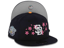 Load image into Gallery viewer, San Diego Padres New Era MLB 9FIFTY 950 Snapback Cap Hat Navy Blue Crown/Visor White Logo With Hot Pink Cherry Blossoms 1998 World Series Side Patch