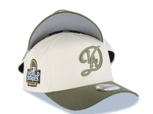 Load image into Gallery viewer, Los Angeles Dodgers New Era MLB 9FORTY 940 Adjustable A-Frame Cap Hat Cream Crown Green Visor Olive City Connect Logo 2024 World Series Side Patch