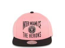 Load image into Gallery viewer, Inter Miami Mitchell & Ness Snapback Cap Hat Pink Crown Black Visor Black Text Logo The Herons (Tail Sweep)