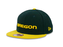 Load image into Gallery viewer, Oregon Ducks New Era 9FIFTY 950 Snapback Cap Hat Green Crown Yellow Visor Yellow Text/Script Logo (Bind Back)