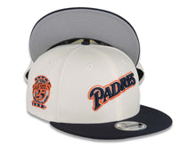 Load image into Gallery viewer, San Diego Padres New Era MLB 9FIFTY 950 Snapback Cap Hat Cream Crown Navy Visor Navy/Metallic Silver Script Logo 25th Anniversary Side Patch Gray UV