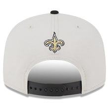 Load image into Gallery viewer, New Orleans Saints New Era NFL 9FIFTY 950 Snapback Cap Hat Stone Crown Black Visor Team Color Logo (2023 Draft On Stage)