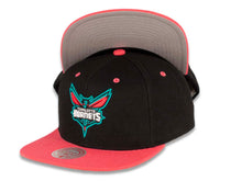 Load image into Gallery viewer, Charlotte Hornets Mitchell & Ness NBA Snapback Cap Hat Black Crown Pink Visor Team Color Logo (Santa Ana)