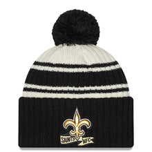 Load image into Gallery viewer, New Orleans Saints New Era NFL Cuffed Pom Knit Beanie Hat Cream/Black Crown/Visor Team Color Logo (2022 Sideline)
