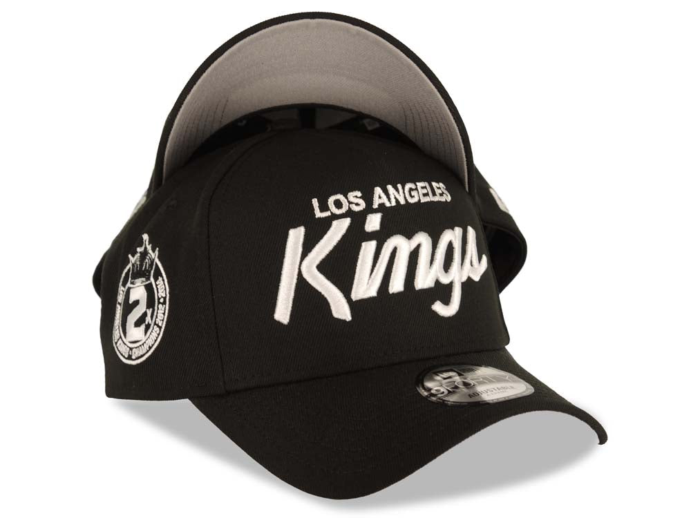 Los Angeles Kings New Era NHL 9FORTY 940 Adjustable A-Frame Cap Hat Black Crown/Visor White Script Logo 2x Champions Side Patch