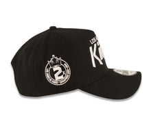 Load image into Gallery viewer, Los Angeles Kings New Era NHL 9FORTY 940 Adjustable A-Frame Cap Hat Black Crown/Visor White Script Logo 2x Champions Side Patch
