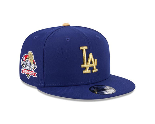 Los Angeles Dodgers New Era MLB 9FIFTY 950 Snapback Cap Hat Royal Blue Crown/Visor Metallic Gold Logo 2024 World Series Champions Side Patch