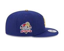 Load image into Gallery viewer, Los Angeles Dodgers New Era MLB 9FIFTY 950 Snapback Cap Hat Royal Blue Crown/Visor Metallic Gold Logo 2024 World Series Champions Side Patch
