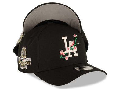 Los Angeles Dodgers New Era MLB 9FORTY 940 Adjustable A-Frame Cap Hat Black Crown/Visor White Logo With Pink Rose 2024 World Series Champions Side Patch