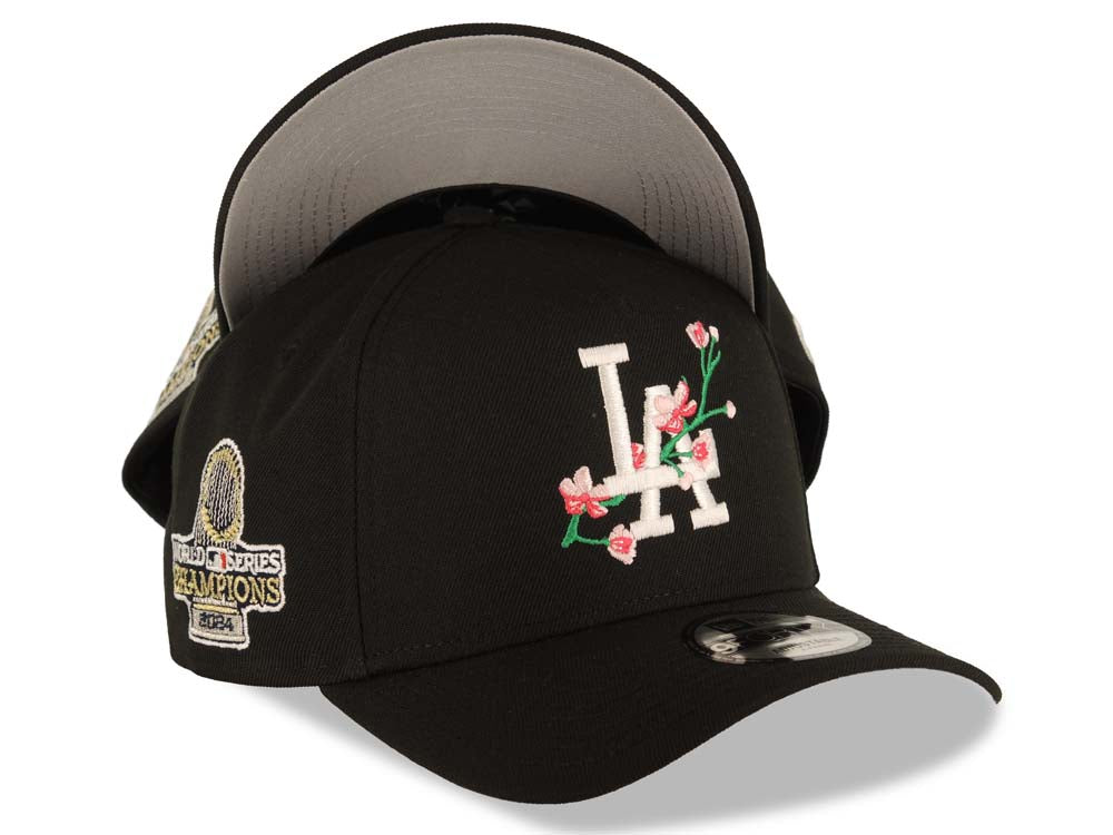 Los Angeles Dodgers New Era MLB 9FORTY 940 Adjustable A-Frame Cap Hat Black Crown/Visor White Logo With Pink Rose 2024 World Series Champions Side Patch