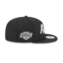Load image into Gallery viewer, Los Angeles Kings New Era NHL 9FIFTY 950 Snapback Cap Hat Black Crown/Visor Silver/White Script/Text Logo
