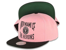 Load image into Gallery viewer, Inter Miami Mitchell &amp; Ness Snapback Cap Hat Pink Crown Black Visor Black Text Logo The Herons (Tail Sweep)
