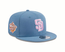 Load image into Gallery viewer, San Diego Padres New Era MLB 9FIFTY 950 Snapback Cap Hat Dark Sky Blue Crown/Visor Pink/White Logo 1998 World Series Side Patch (Color Pack)
