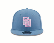 Load image into Gallery viewer, San Diego Padres New Era MLB 9FIFTY 950 Snapback Cap Hat Dark Sky Blue Crown/Visor Pink/White Logo 1998 World Series Side Patch (Color Pack)
