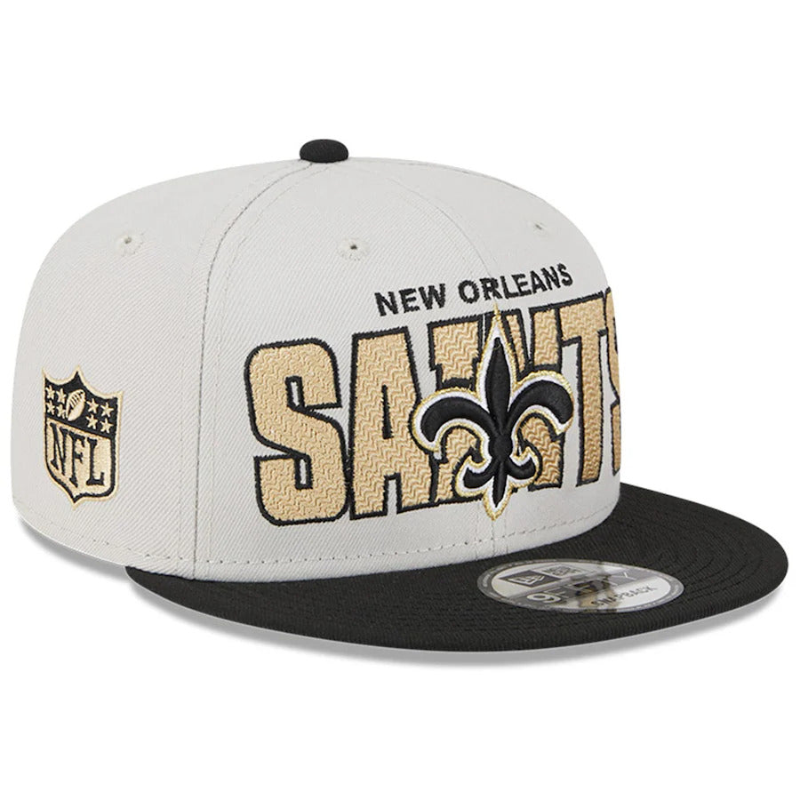 New Orleans Saints New Era NFL 9FIFTY 950 Snapback Cap Hat Stone Crown Black Visor Team Color Logo (2023 Draft On Stage)